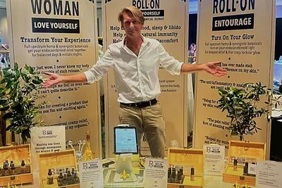 John branding at the booth.