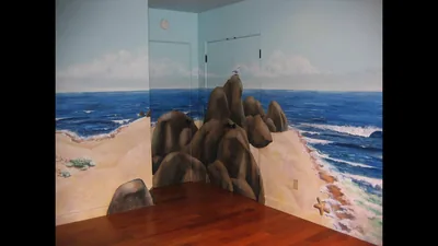 Children's room trompe l'oeil ocean mural over romm and closet doors